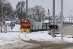 2104 rolls through the north city of the city with cars from Lowell and Ada